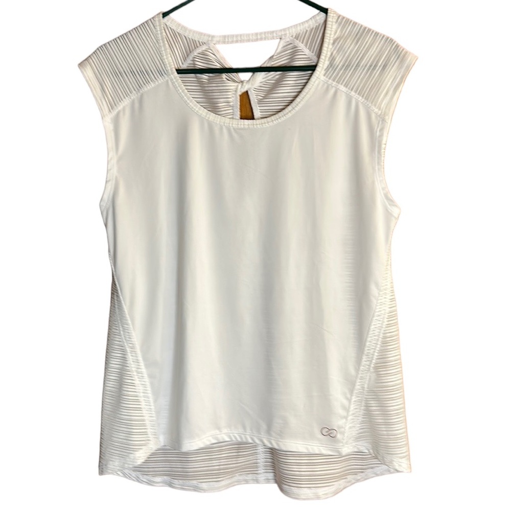 Calia White Work out top with twist at keyhole. Sheer in back, solid white front